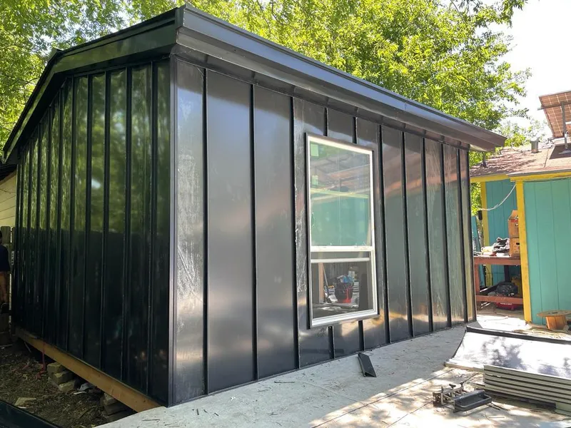 Black standing seam metal wall panels for Roof Inspection in Hurricane